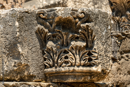 Carved capitals with interesting designs at Capernaum, Kfar Nahum, Capharnaum in Israel
 photo