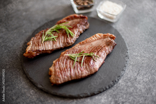 grill Picanha steak on stone background with spices