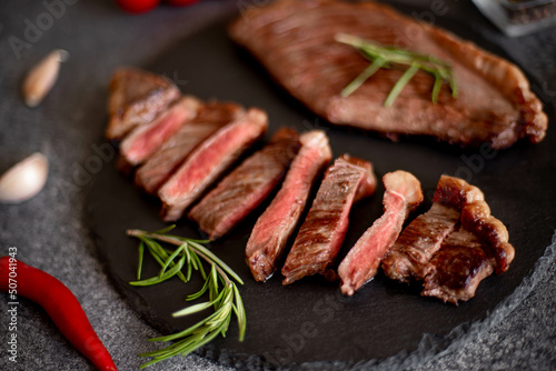 grill Picanha steak on stone background with spices