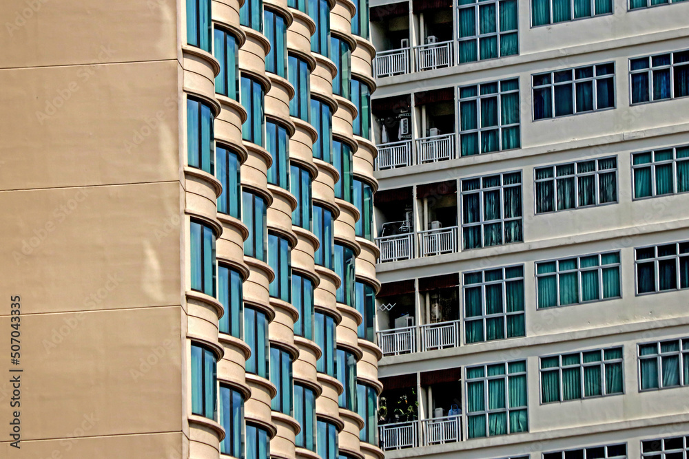 The condominium building in the city The condominium building in the city