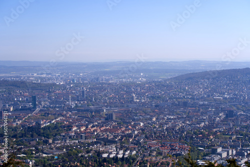 Aerial view over City of Z  rich on a beautiful spring day with blue cloudy sky background. Photo taken April 21st  2022  Zurich  Switzerland.