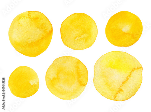 Yellow watercolor round stains isolated on a white background. Set of abstract hand-drawn elements. Bright paint swatches on paper