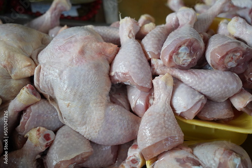 Almaty, Kazakhstan - 03.25.2022 : Chilled chicken legs laid out for sale in a hypermarket photo