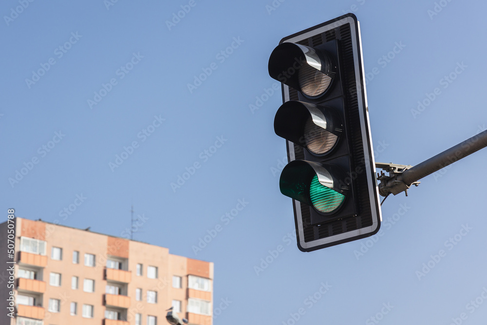 Traffic light with green light in Warsaw city, Poland
