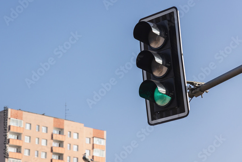 Obraz na płótnie Traffic light with green light in Warsaw city, Poland w salonie