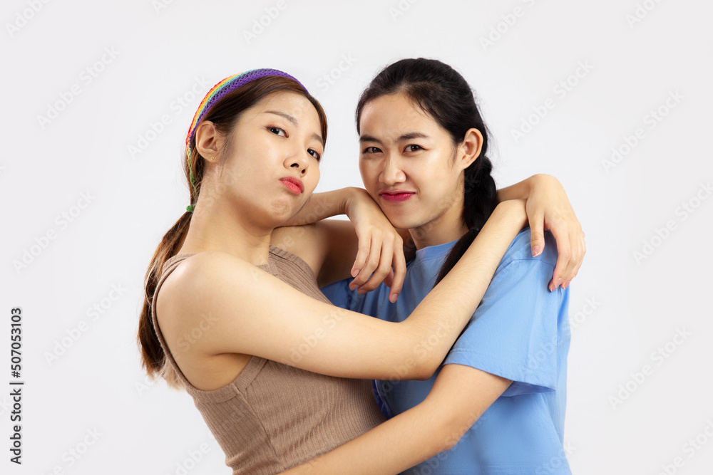 concept of lgbt couple, Two asian women isolated on white background. love pride month concept of lgbt couple, Two asian women isolated on white background. love pride month