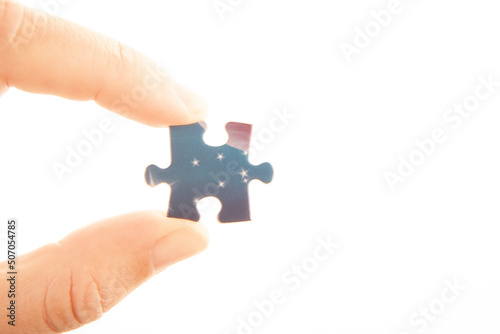 image of paper puzzle element hand white background 