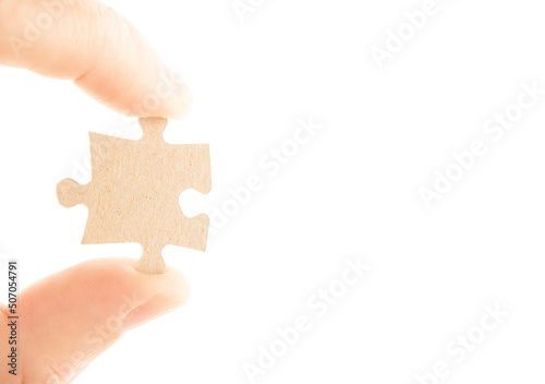 image of paper puzzle element hand white background 