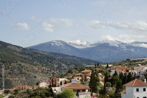 View of the Granada town of Vélez de Benaudalla (Spain) with Sierra Nevada in the background