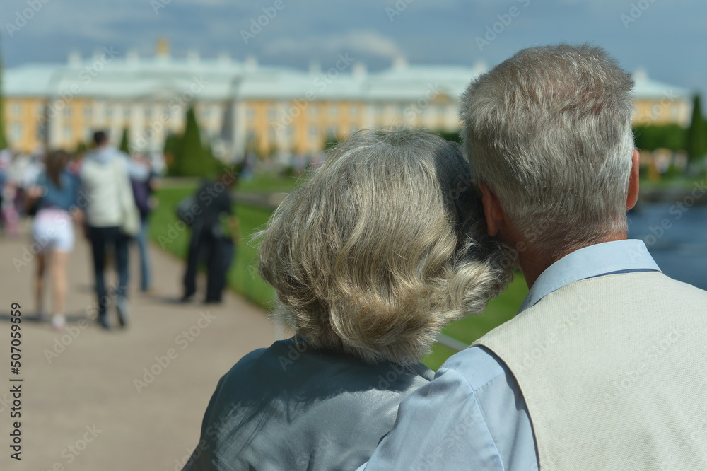 beautiful happy Mature couple traveling. back view beautiful happy Mature couple traveling. back view