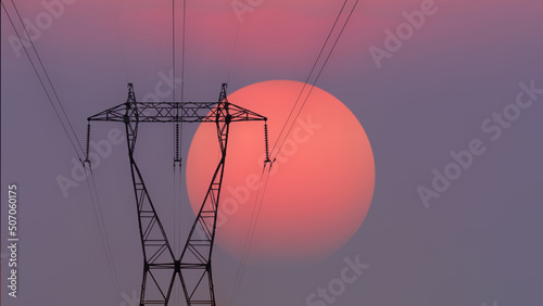 Photo high voltage electricity tower silhouette at sunset with copy space
