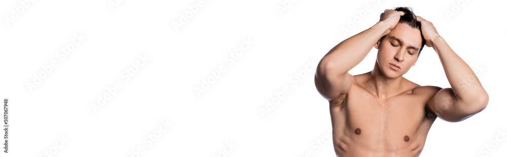 shirtless man posing with closed eyes and hands on head isolated on white, banner. shirtless man posing with closed eyes and hands on head isolated on white, banner.