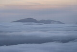 Snowdonia mountains above a spectacular cloud inversion in Wales UK