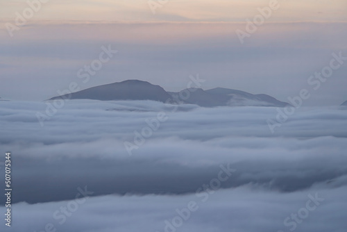 Snowdonia mountains above a spectacular cloud inversion in Wales UK