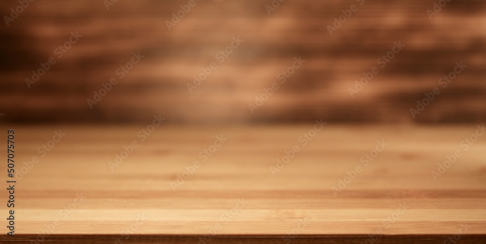 Bokeh wooden backdrop in a perspective view. focused bottom front view of a wooden backdrop mockup for products or food items advertising and editing. Bokeh wooden backdrop in a perspective view. focused bottom front view of a wooden backdrop mockup for products or food items advertising and editing.