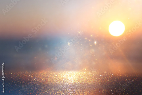 background of blurred beach and sea with bokeh lights