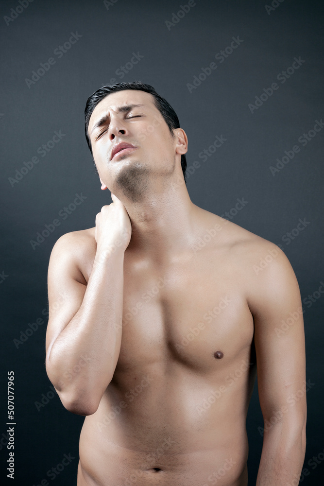 Young Male is Having Pain On His Neck Young Male is Having Pain On His Neck