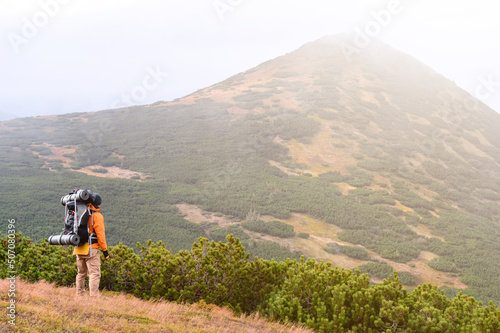 Adventure lifestyle, travel in the mountains with a backpack and overnight.