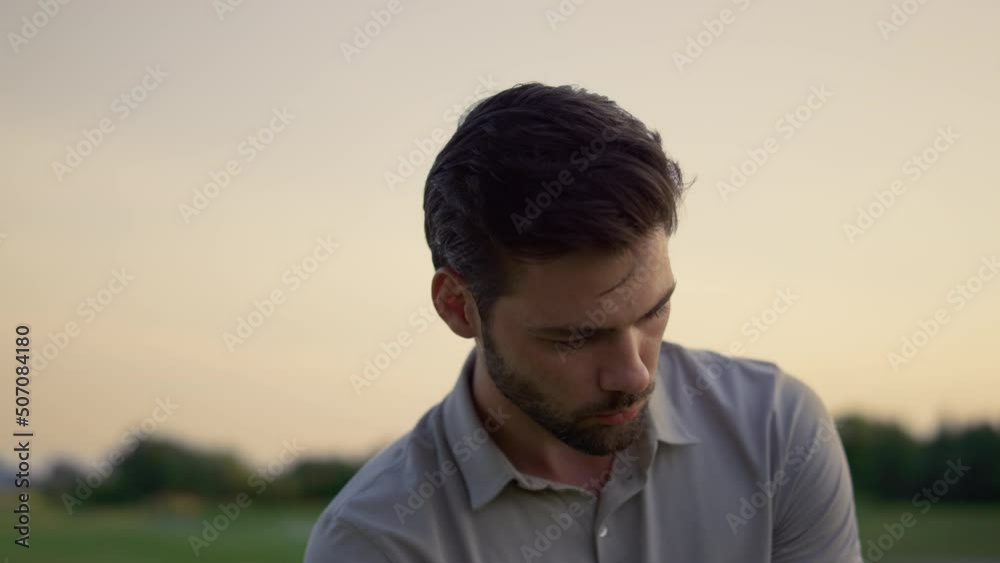 Handsome man celebrate successful golf game on sunset nature fairway course. Handsome man celebrate successful golf game on sunset nature fairway course.