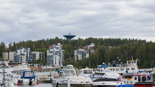 Finland cityscape, water tower, buildings and boats