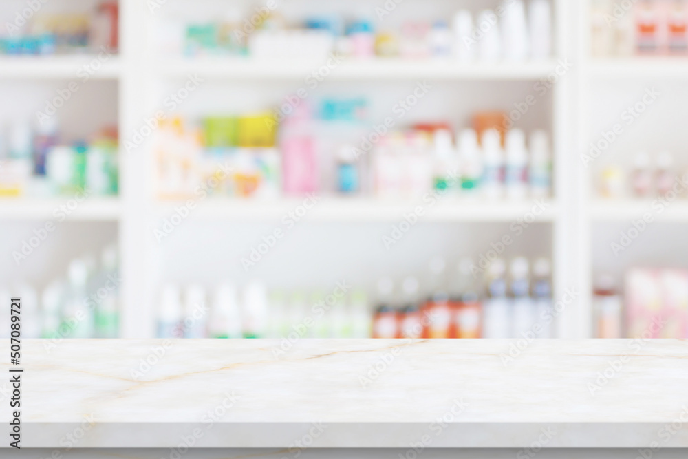 Empty white marble counter top with blur pharmacy drugstore shelves background