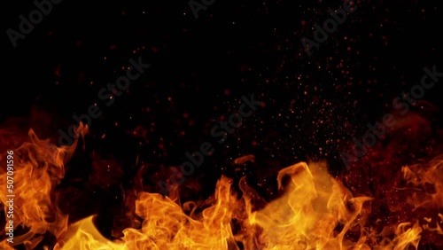 Super slow motion of fire blast isolated on black background. Filmed on high speed cinema camera, 1000 fps. photo