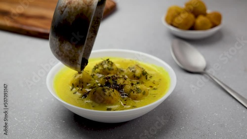 kadhi pakora is ready to serve, tempering with ground spices roasted in desi ghee photo