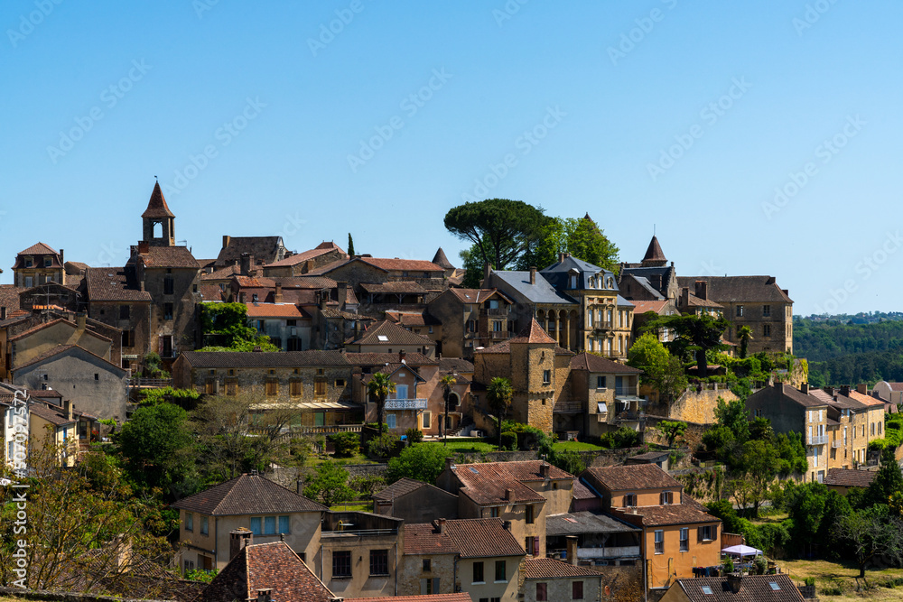 view of the idyllic French country town of Belves in the Dordogne Valley