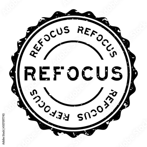 Grunge black refocus word round rubber seal stamp on white background