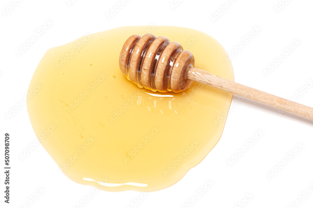 Wooden dipper with honey isolated on a white background. Golden organic floral honey natural. Wooden dipper with honey isolated on a white background. Golden organic floral honey natural.