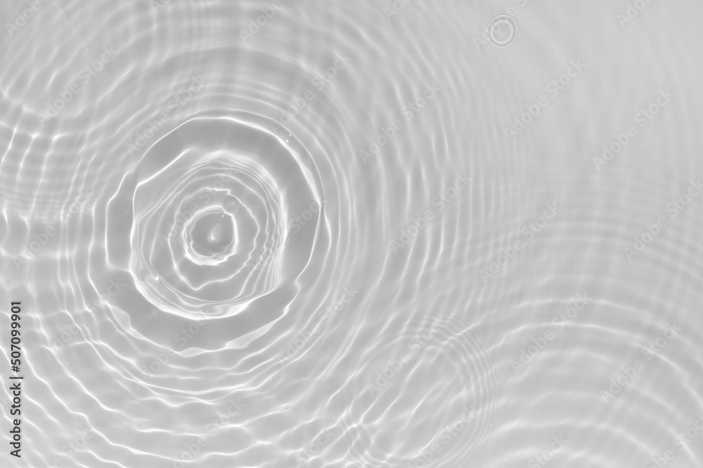 Water texture with sun reflections and water circles on the water surface Overlay effect for photo or mockup. Organic light gray drop shadow caustic effect refraction of light. Banner with copy space. Water texture with sun reflections and water circles on the water surface Overlay effect for photo or mockup. Organic light gray drop shadow caustic effect refraction of light. Banner with copy space.