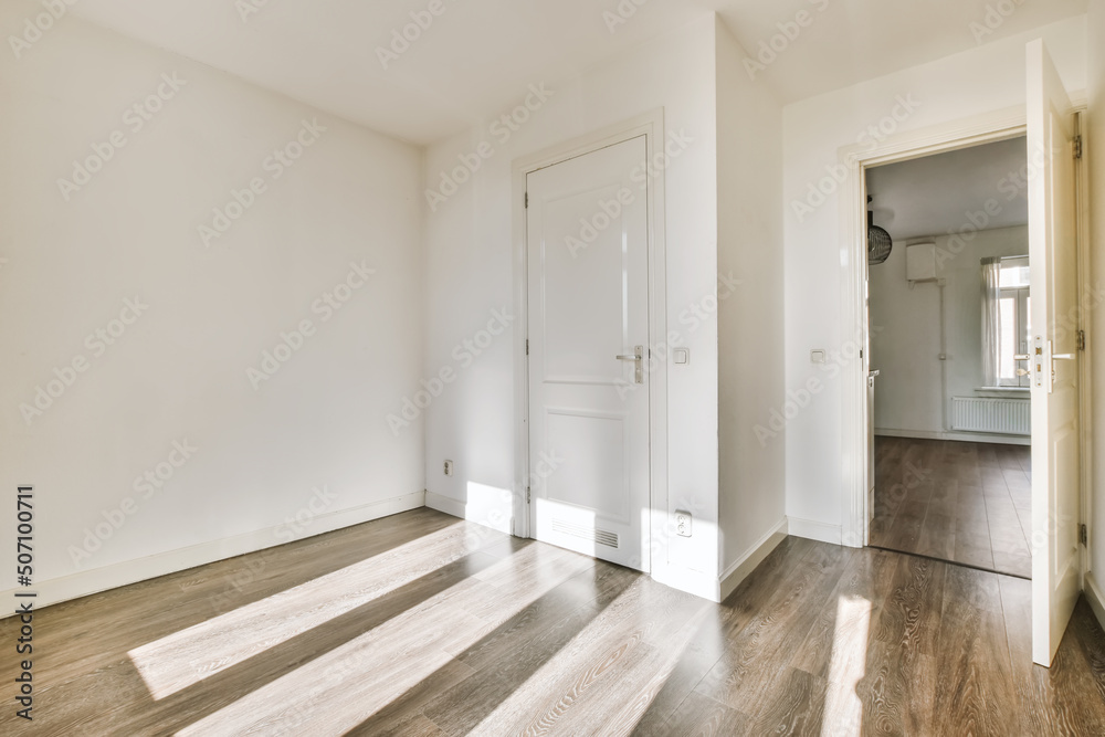 Empty white living room in modern house Empty white living room in modern house