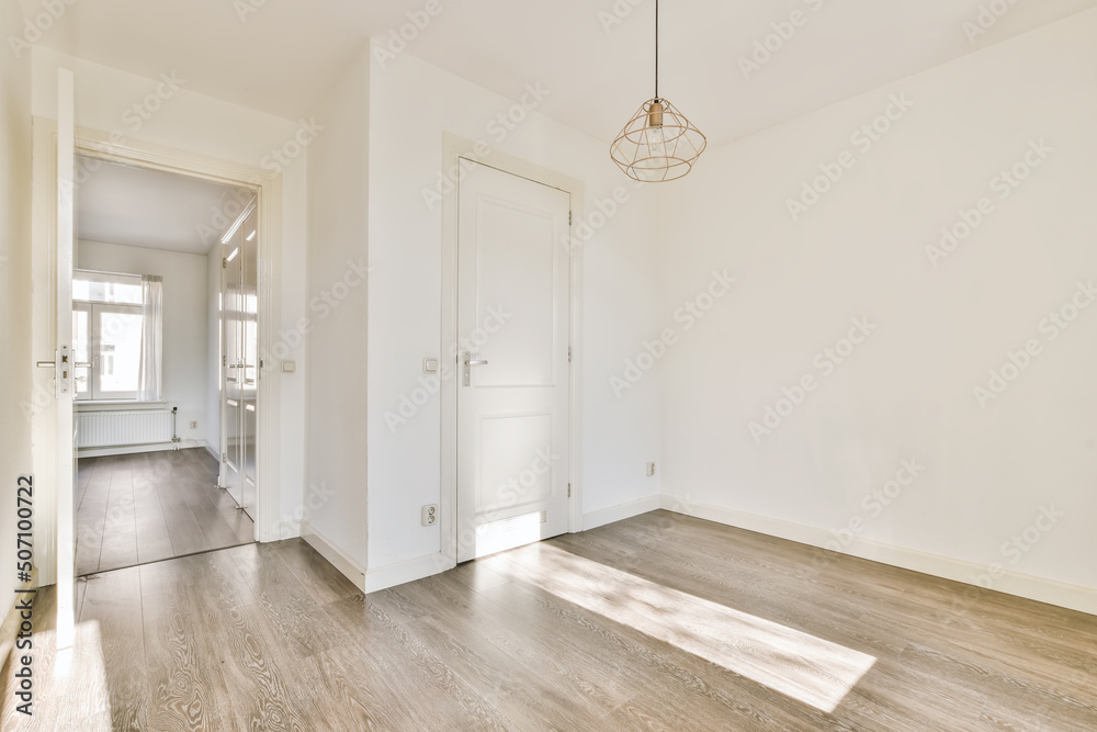 Empty white living room in modern house Empty white living room in modern house