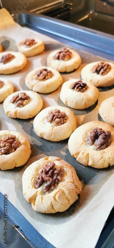 Shortbread cookies with walnuts close-up.