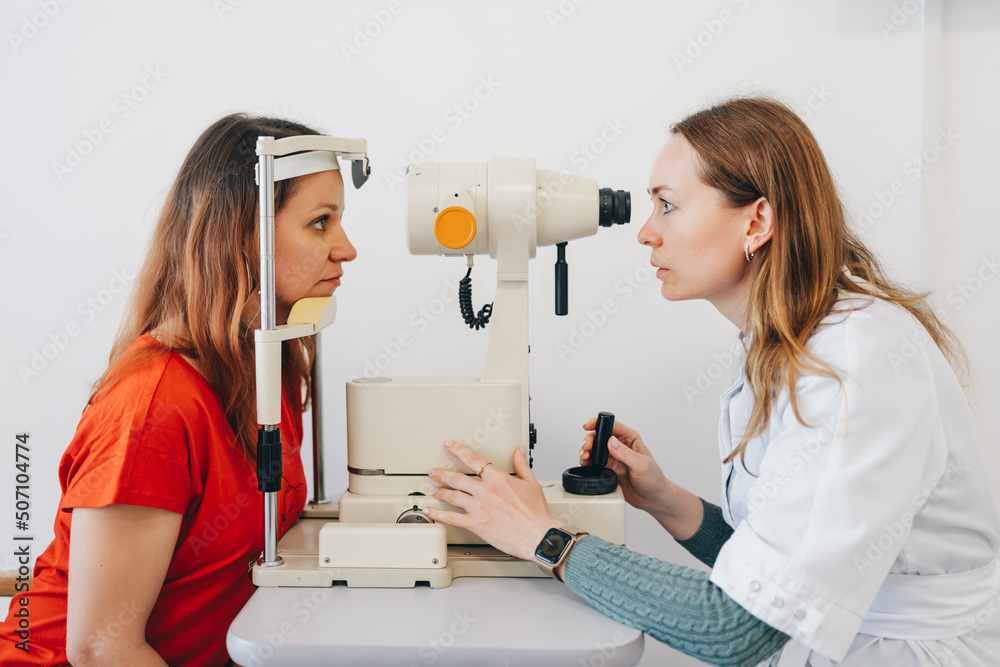 Eye test for visual acuity. The patient receives eye consultation. Eye test for visual acuity. The patient receives eye consultation.