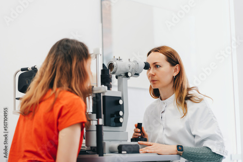 Eye test for visual acuity. The patient receives eye consultation.
