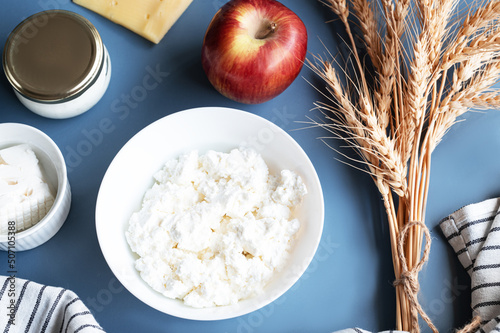 Close up of dairy products on blue background photo