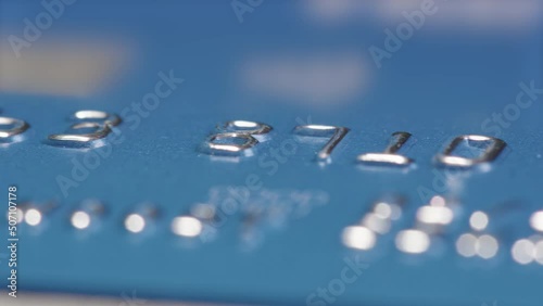 MACRO SLIDER shot of a credit cards numbers photo