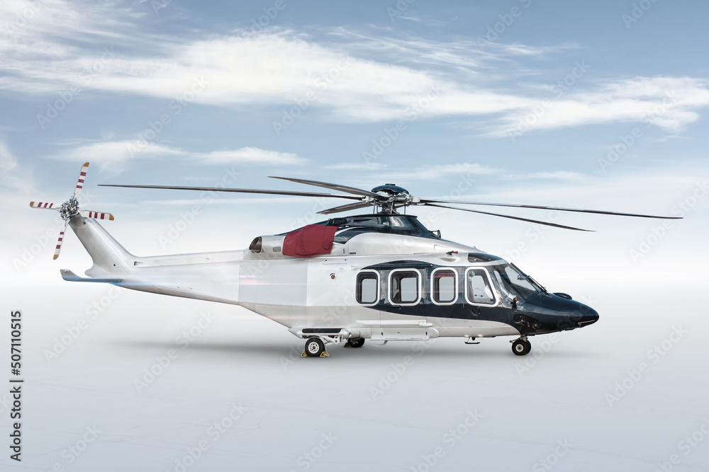 Naklejka premium Luxury business helicopter isolated on bright background with sky