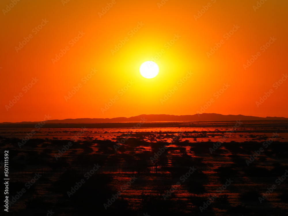 Fototapeta premium Sunset over African landscape