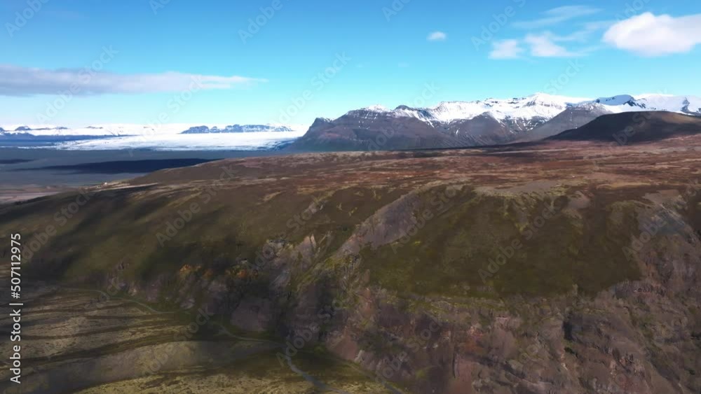 Beautiful Icelandic nature during summer time and sunny weather. Magical Iceland with green mountains, fields and waterfalls. Beautiful Icelandic nature during summer time and sunny weather. Magical Iceland with green mountains, fields and waterfalls.