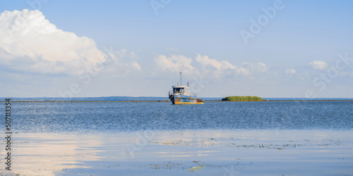 fishing boat near the coast of the Baltic Sea on a sunny day