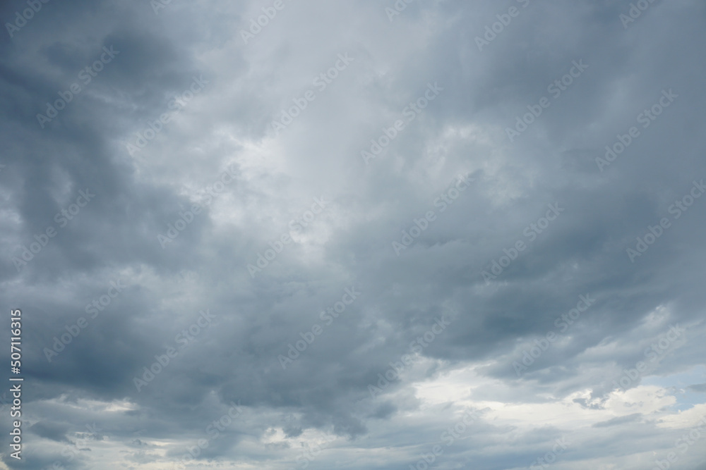 Nimbostratus clouds are dark, grey, featureless layers of clouds situated low in the sky. Nimbostratus clouds are dark, grey, featureless layers of clouds situated low in the sky.