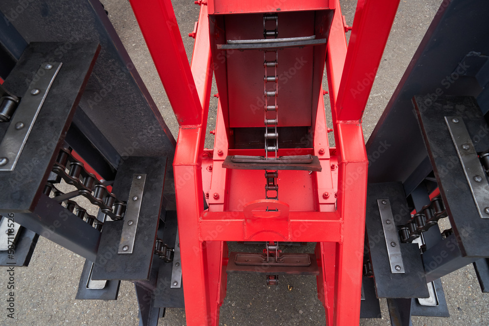 Grain loader. Chain scraper conveyor.