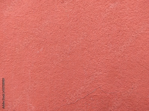 Red wall.Cement Red plaster wall have rough surface concrete. For texture background images.Red paper background, colorful paper texture.