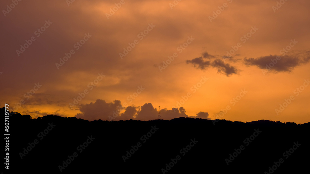 Beautiful sunset with clouds sky background.