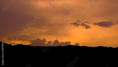Beautiful sunset with clouds sky background.