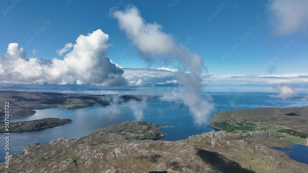 Aerial view of the landscape surrounding Diabaig, Lower Diabaig and Torridon village in the north west highlands of Scotland during summer on a blue sky day with light clouds Aerial view of the landscape surrounding Diabaig, Lower Diabaig and Torridon village in the north west highlands of Scotland during summer on a blue sky day with light clouds