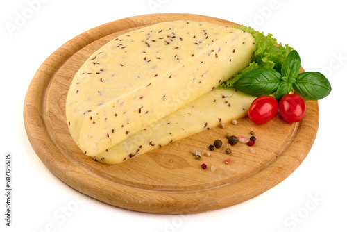 Traditional Latvian homemade cheese with cumin seeds for annual Latvian festival celebrating the summer solstice Ligo holiday. Isolated on white background.