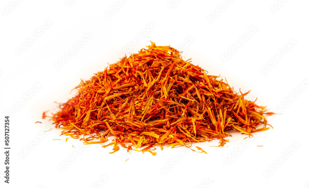 Saffron spice, pistils and stigmas of a crocus flower close-up on a white background. Indian and Arabic spices for cooking. Medicinal herbs and spices. Saffron spice, pistils and stigmas of a crocus flower close-up on a white background. Indian and Arabic spices for cooking. Medicinal herbs and spices.